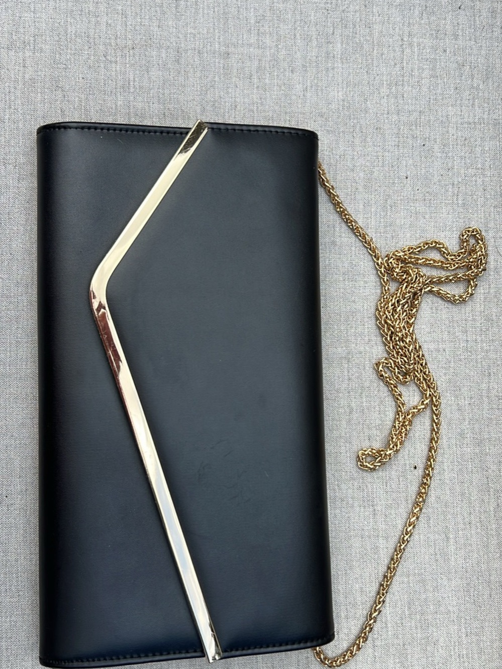LE CHATEAU Sleek Black Envelope Clutch with Gold Accent Chain